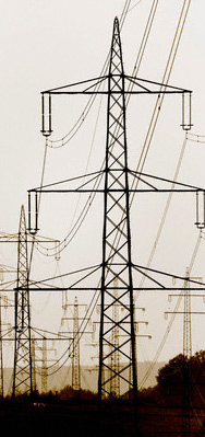 Lattice transmission towers carrying overhead lines